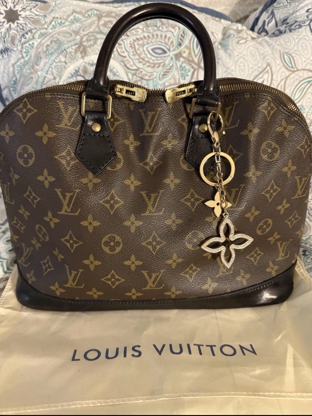 Louis Vuitton Brown Monogram Alma Satchel with Gold Charm